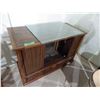 Image 1 : old TV converted to storage with miscellaneous Glass