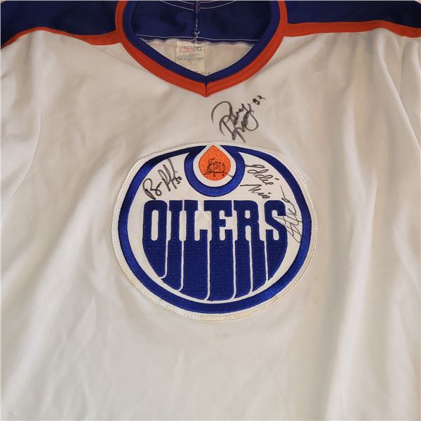VTG SIGNED EDMONTON OILERS JERSEY (GOALIES) (RANFORD, MIO, REDDICK, FUHR)