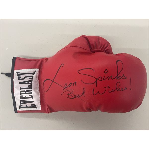 Everlast Boxing Glove Signed "Leon Spinks" - Unauthenticated AND Muhammad Ali "Underwater Training"