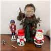 Image 2 : Christmas Lot with Blue-Eyed Santa Doll, Decorative Hockey Nutcracker, Santa and Snowman Candles