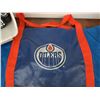 Image 2 : Edmonton Oilers Branded Hockey Equipment Bag with 4 Buckets of Pucks, Used Condition