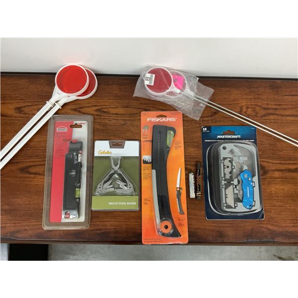 Various New Tools in Packaging: Fiskars Saw, Cabela's Multi-Tool, Jobmate Laser, Utility Knife