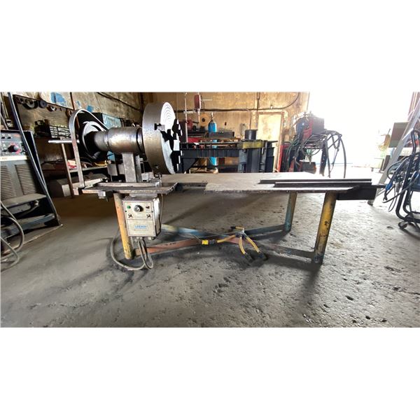 CUSTOM MADE STEEL WORK TABLE WITH ELECTRIC TURNING SYSTEM AND 3 JAW LATHE CHUCK - APPROX, 5FT X