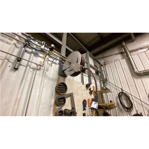 RETRACTABLE AIR HOSE REEL- APPROX 50'. BUYER TO REMOVE FROM WALL