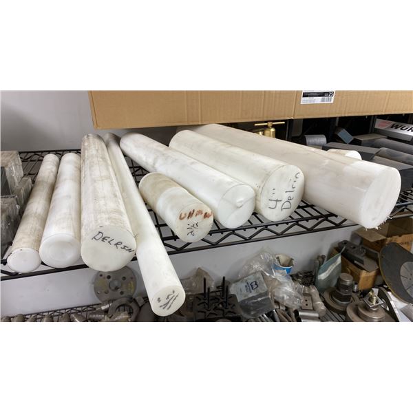 SEVERAL LENGTHS OF DELRIN PLASTIC FOR MILLING. THE LARGEST PIECE IS 8 1/4  DIAMETER X 12 