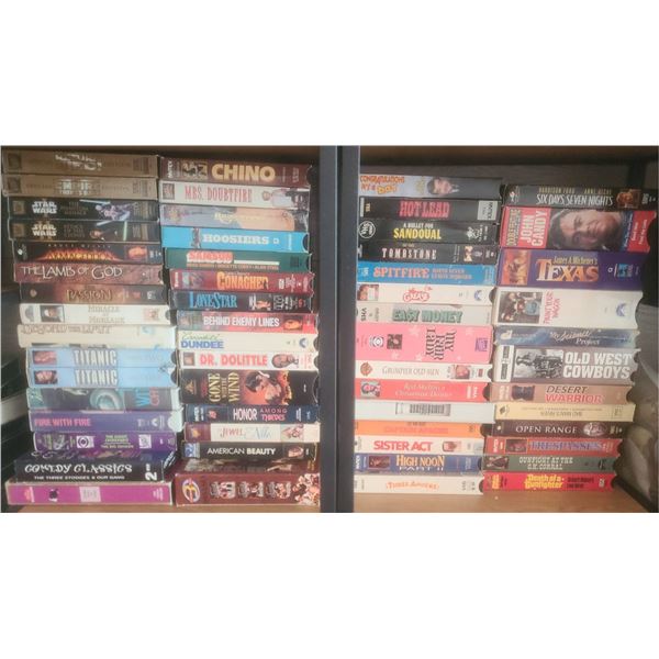 Selection of VHS Tapes Featuring Classic Films and TV Shows