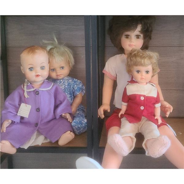 Four Vintage Dolls in Original Clothing