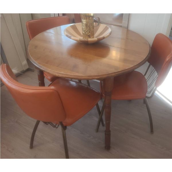 Dining Set: Round Wood Table, 3 Orange Vinyl Chairs