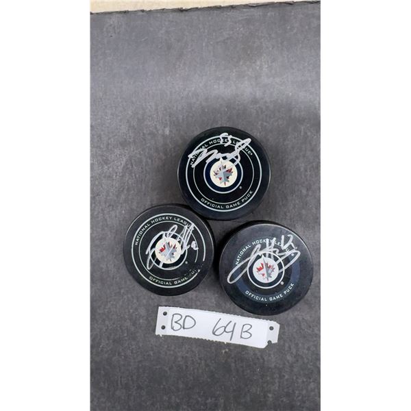 Winnipeg Jets Mark Scheifele, Jacob Trouba, And Jansen Harkins Autographed Game Pucks