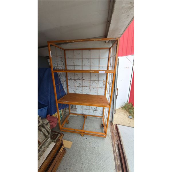 Orange Metal and Wood Rolling Display Shelf with Wire Grid Sides and Back. 76”×42”×24”