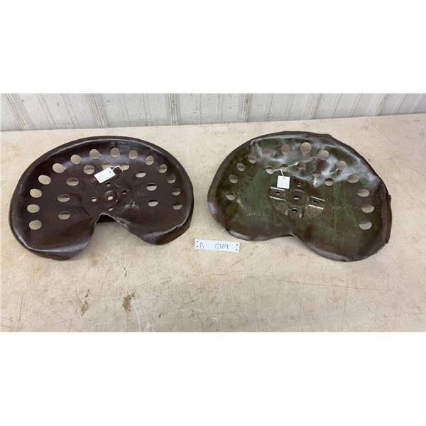 Pair of Vintage Metal Pan Tractor Seats with Ventilation Holes and Central Mounting Plates