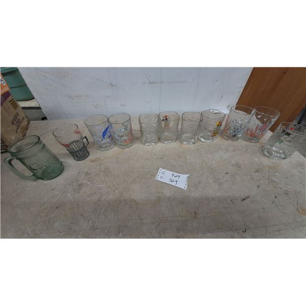 Collection of Disney and Coca-Cola Drinking Glasses and Mugs