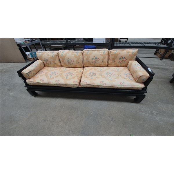 Black Lacquered Sofa with Floral Upholstery and Cushions. 86” wide