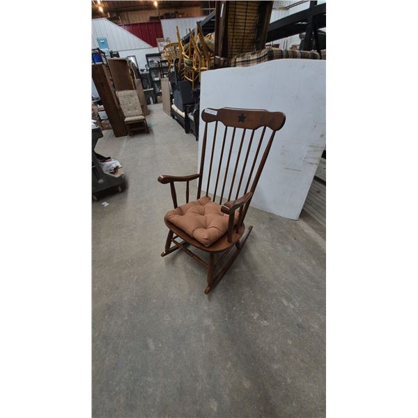 Wooden Rocking Chair with Star Cutout and Brown Seat Cushion