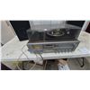 Image 2 : Vintage All-in-One Stereo System with Turntable, Cassette, 8-Track, AM/FM and 2 Speakers