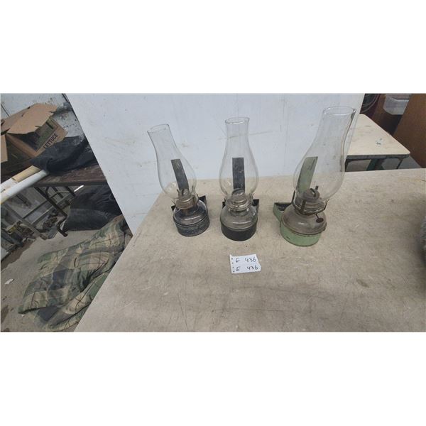 Three Kerosene Lanterns with Clear Glass Chimneys and Metal wall mount