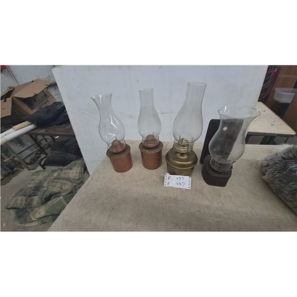 Four Oil Lamps: Two Copper-Toned, One Brass-Toned, and One Wall-Mountable with Iron Base