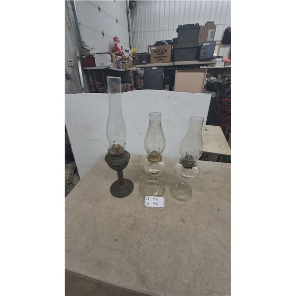 Three Kerosene Lamps: One Metal Base with Glass Chimney and Two Glass Base with Glass Chimneys