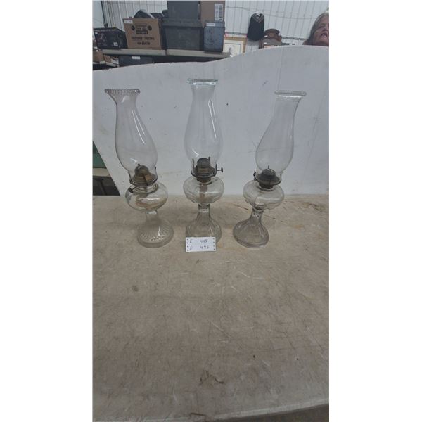 Three Clear Glass Kerosene Lamps with Chimneys and Burners