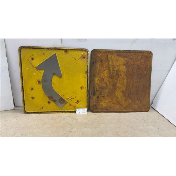Two Yellow Metal Curved Arrow Road Warning Signs, 24 × 24”