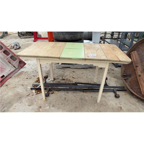 Wood Table with 2 Leafs 31 × 30 × 57”