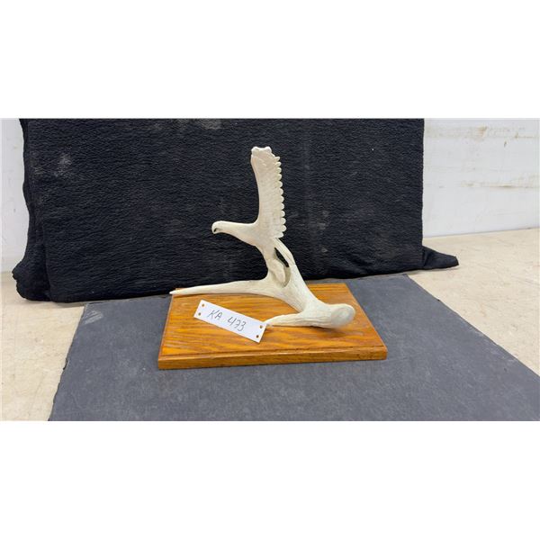 Hand-Carved Eagle Sculpture on Deer Antler with Wooden Base, 10 × 11 × 7”