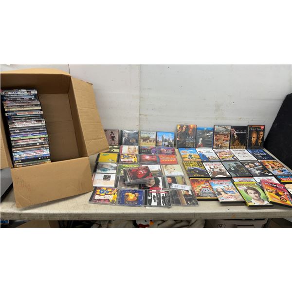 Large Collection of DVDs and Music CDs Including Iron Man, Click