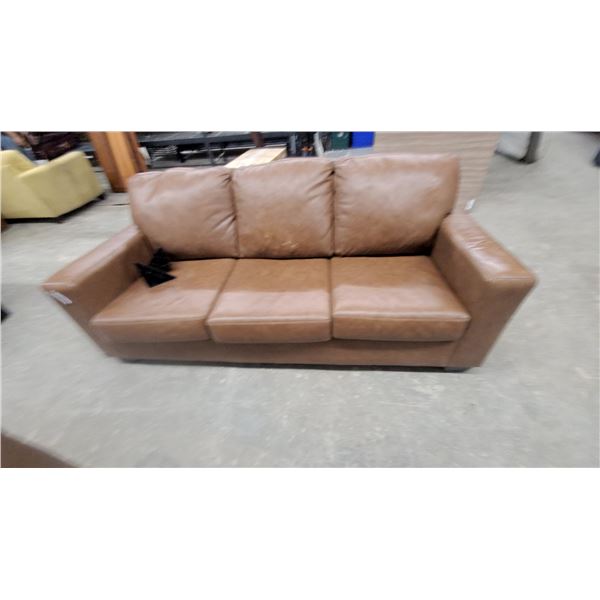 Brown Faux Leather Three-Seat Sofa and Two Black Plastic Triangles