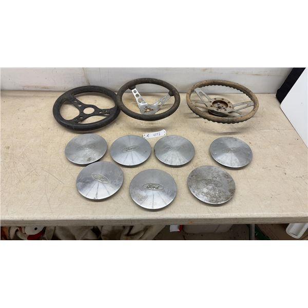 Vintage Ford Script Hubcaps, 6 1/2” Diameter and Assorted Three-Spoke Steering Wheels