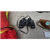 Image 4 : Bow, Binoculars, Life Jackets, Wet Gear 3-Piece Rainsuit, and Black Bag with air mattress i think