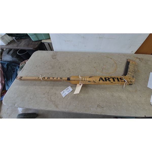 Two Artis and Cooper Wooden Hockey Sticks