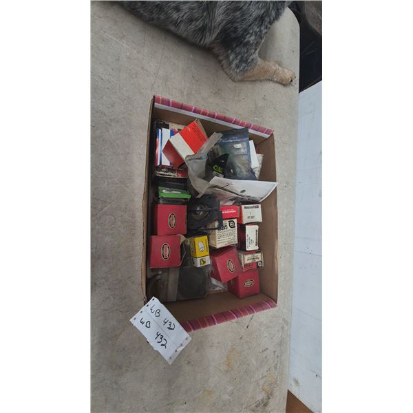 Box of Rotunda, Motorcraft, and Carquest Auto Parts: Thermostats, Relays, Cables