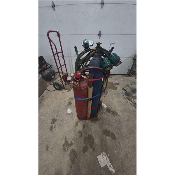 Oxy-Acetylene Welding Torch Set on Cart with Tanks, Hoses, Regulators, and Welding Rods