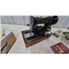 Image 3 : Singer Sewing Machine with Attachments, Instructions, and Original Boxes