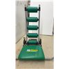 Image 2 : AbMaxx Abdominal Exercise Machine with Green Padded Seat and Five Support Rollers