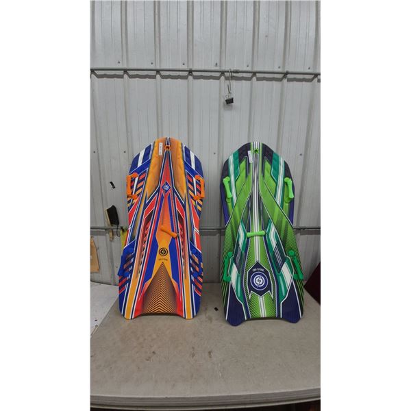 Two Sno-Storm Snow Sleds, Orange and Blue, Green and Blue, with Handles and Pull Ropes never used