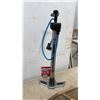 Image 4 : Schwinn Air Center Max Floor Pump, Pair of Ice Skates, and Pair of Snowshoes