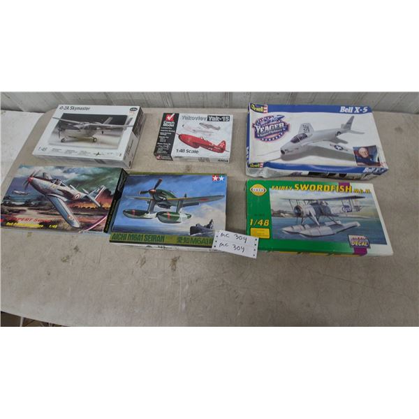 Six 1/48 Scale Model Airplane Kits: Revell O-2A Skymaster, Yakovlev Yak-15, Bell X-5, Bell P-63C Ki