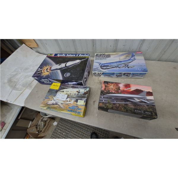 Revell Apollo Saturn V Rocket, Academy B-377 Stratocruiser, and Pegasus Space Ark 4 Model Kits