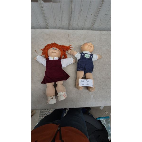 Two Cabbage Patch Kids Dolls: Red Hair Girl in Maroon Dress and Bald Boy in Denim Overalls. Vintage