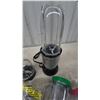 Image 2 : Magic Bullet Blender and Accessories: Blender Base, 2 Blade Attachments, 5 Cups, 3 Lids, and More.