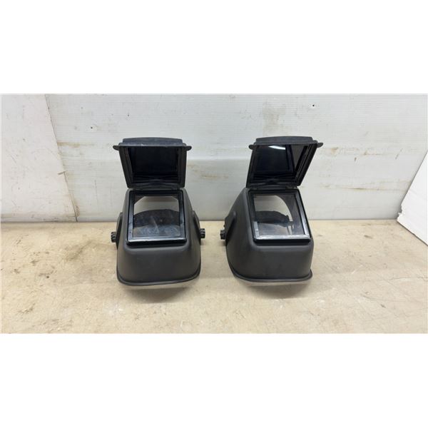 Pair of Black Welding Helmets with Flip-Up Visor and Adjustable Headgear