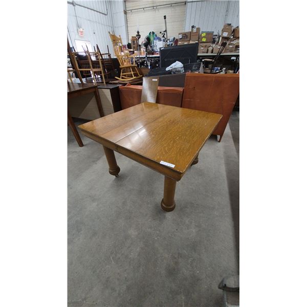 Oak Dining Table with Casters and 12” Leaf, Quarter-Cut