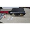 Image 2 : Red fishing rod Tube Case, Black Briefcase, 4 Pkgs Ice Grips, and Bee Playing Cards