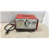 Image 2 : Motomaster 6 Amp 6/12V Battery Charger, Booster Cables, Polypropylene Rope and Safety Triangles