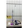 Image 1 : Shark Steam Mop with instructions and extra mop head, and Black and Decker Flex Vac Handheld