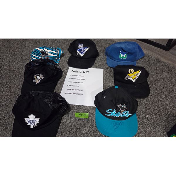 Seven NHL Baseball Caps.