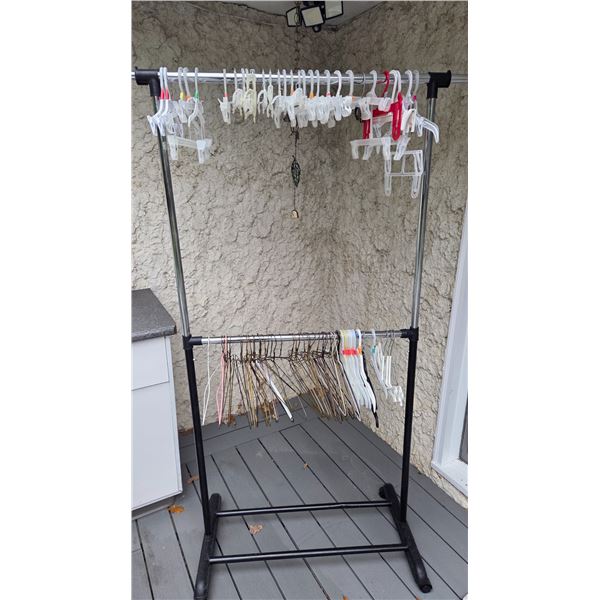 2 Tier Main Stays Coat Rack Complete With 90 Assorted Clothes Hangers.