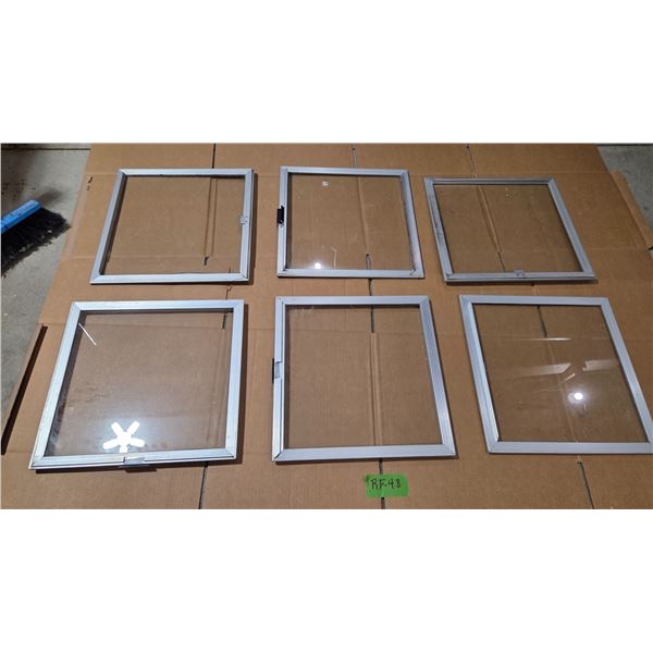 Six 16 Inch × 17 Inch Aluminum Slider Glass Windows.