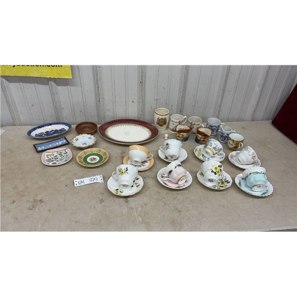 Assortment of Fine China Including Teacups, Saucers, Platters, Toby Jugs